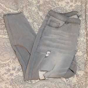 Grey distressed skinny jeans